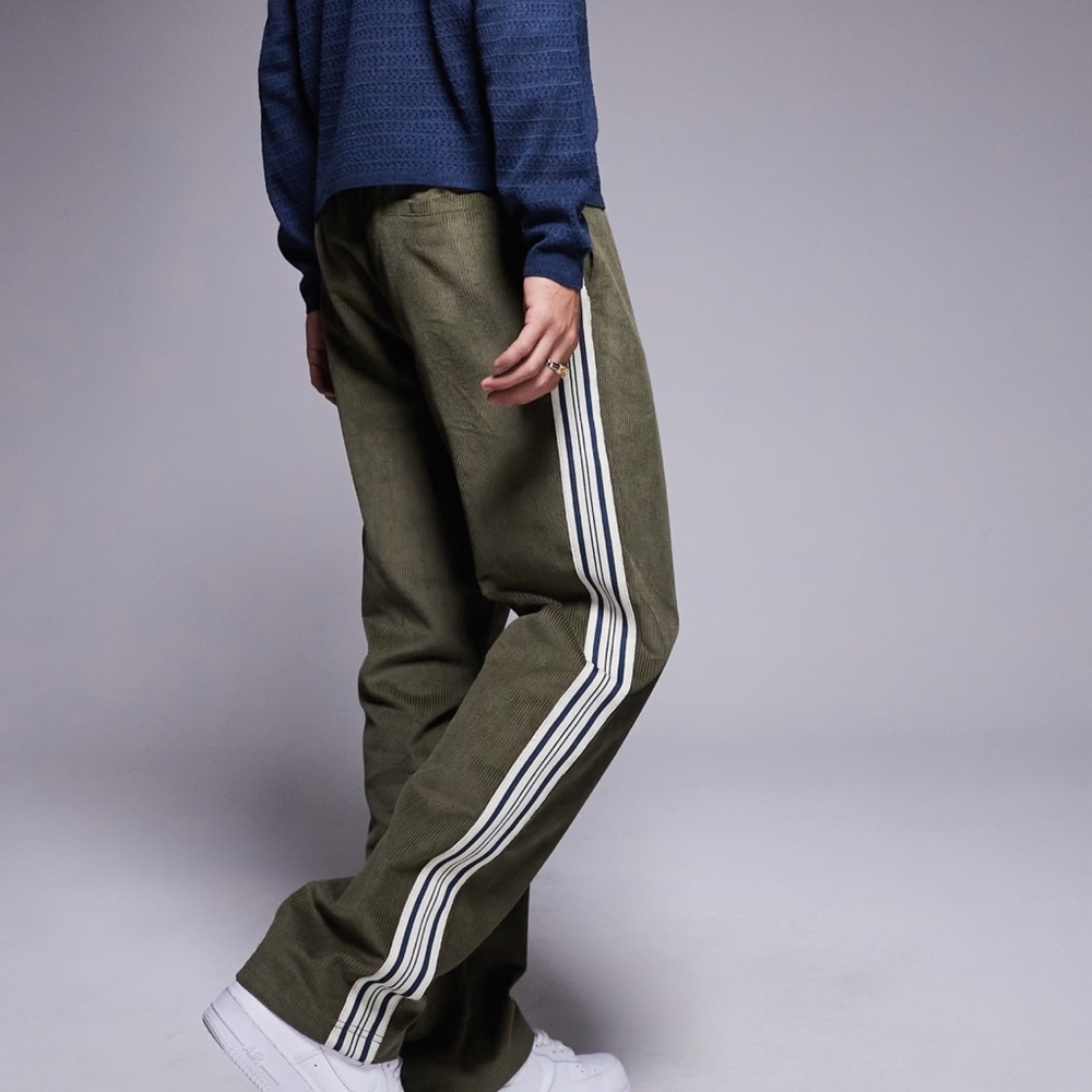 ASOS DESIGN pull on baggy pants with stripe detail in green corduroy